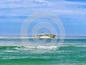 Yellow cruise boat Gulf of Mexico Panama City Florida photo