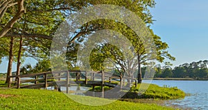 A beautiful day for a walk and the view of the wood bridge to the island at John S. Taylor Park in Largo, Florida.