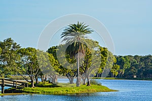 A beautiful day for a walk and the view of the wood bridge to the island at John S. Taylor Park in Largo, Florida.