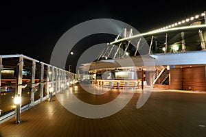 Beautiful deck of a cruise ship at night without people