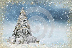 Beautiful decorated christmas tree in a snowy blue winterlandscape