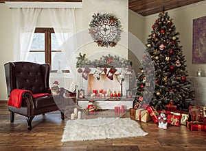 Beautiful decorated living room with a christmas tree and a fire place