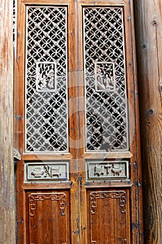 Beautiful decorated wooden doors in Hongcun, China
