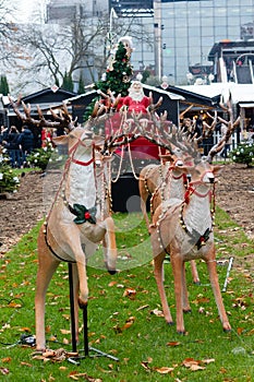 Beautiful decoration with deers and santa in a christmas market