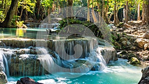 Beautiful deep forest Erawan waterfalls in Thailand