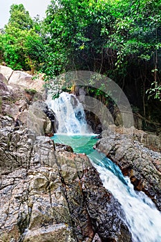 Beautiful deep forest waterfall in Thailand