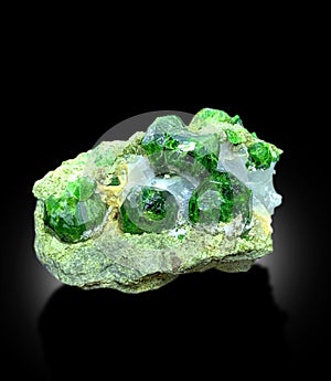 Beautiful deep green color demantoid garnet on matrix specimen from iran photo