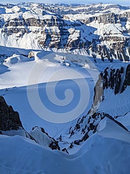 beautiful deep snow tracks from the teufelsjoch mountain down towards the glacier firn. Uri Glarus Switzerland