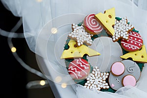 Beautiful and delicious gingerbread with pieces of cheese, mouse, balls for the Christmas tree