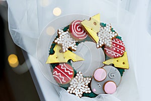 Beautiful and delicious gingerbread with pieces of cheese, mouse, balls for the Christmas tree