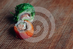 Beautiful delicious sushi. Sushi delivery. Advertising sushi rolls made of fish and cheese.