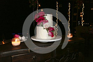 A beautiful and delicious wedding cake. photo