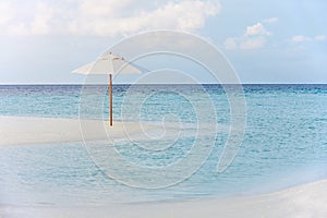 Beautiful Deserted Beach With Parasol photo
