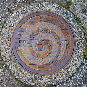 Beautiful design of manhole cover in Hikone