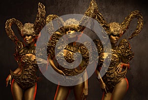 Beautiful devil women with golden ornamental horns