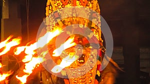 Beautiful devotional procession in temple at night