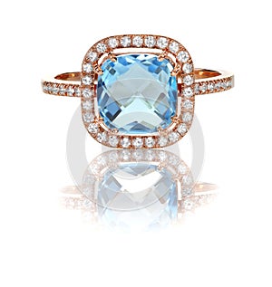 Beautiful Diamond ring with blue topaz blue gemstone cushion cut center stone