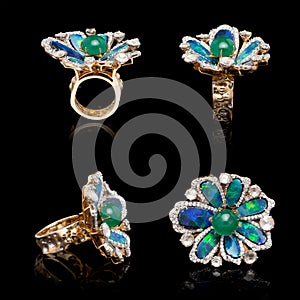 Beautiful Diamond Ring, with many different blue-green gemstones