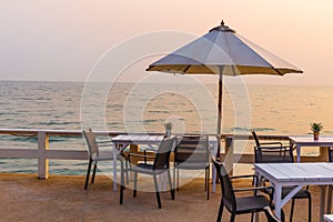 Beautiful dinner table setting on the beach