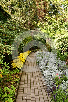 A beautiful display garden and a pathway.