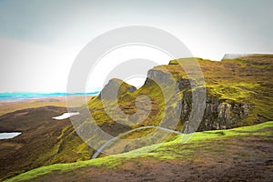 Beautiful display of the landslip, mountain hill Quiraing with mountain trails in Scotland