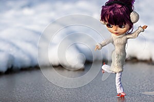 Beautiful, doll blythe, skates on ice, purple hair and winter clothes. 2