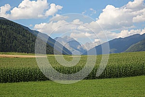 Beautiful Dolomite Mountains Tower Above Italian Farmland