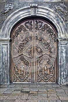 Beautiful door art at San Agustin Church, Manila, Philippines photo