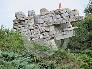 Beautiful dragon-shaped stone wall coming out of the earth