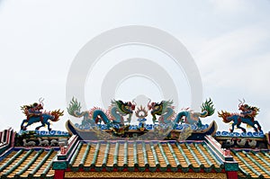 Beautiful Dragon statue and Kylin on top roof