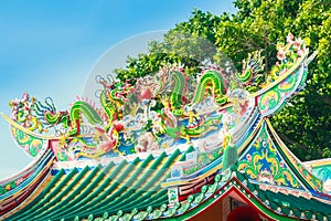 Beautiful Dragons Sculpture on the Chinese Pavilion Roof in the