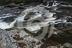 Beautiful dramatic landscape image of Aysgarth Falls in Yorkshire Dales in England during Winter morning