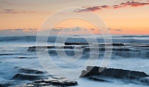 Beautiful dramatic Sunset over a rocky coast