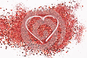 Beautiful drawing a heart on a glitters background. Love concept