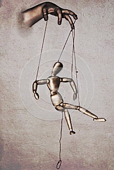 Beautiful drawing of a marionette manipulated by a puppeteer - concept of pliability