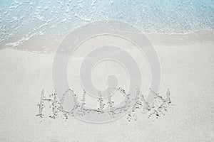 beautiful drawing on the sand near the sea shore background
