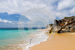 Beautiful Dreamland Beach Bali, with clean sand and rocks.
