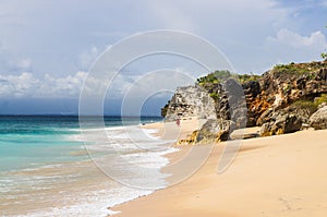 Beautiful Dreamland Beach Bali, with clean sand and rocks.