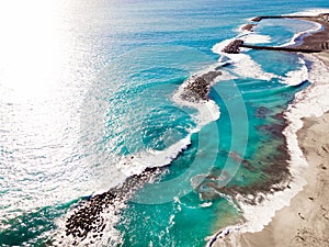 Beautiful drone shot coastline of Playa de Fanabe, Teneriffe, Canary Islands, Spain photo
