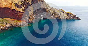 Beautiful drone view of Sao Lourenco peninsula, with high steep cliffs and basalt rock formations. Madeira Island