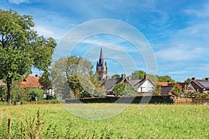 Beautiful dutch summer countryside landscape with rural village, church tower - Thorn (Limburg), Netherlands