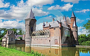 Beautiful dutch water moat castle with towers - Kasteel Heeswijk, Netherlands