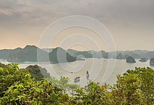 Beautiful early morning view over the islands of Ha Long Bay, Vietnam photo