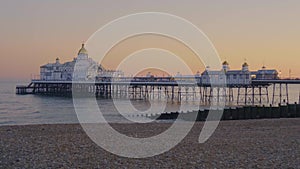 Beautiful Eastbourne pier at the English coast in the evening