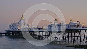 Beautiful Eastbourne pier at the English coast in the evening