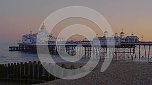 Beautiful Eastbourne pier at the English coast in the evening