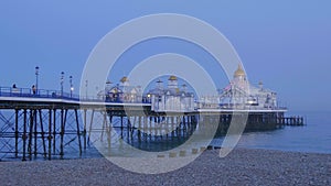 Beautiful Eastbourne pier at the English coast in the evening