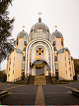 beautiful eastern church in fall - autumn leaves