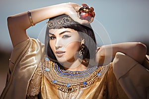 Beautiful Egyptian woman like Cleopatra outdoor