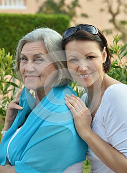 Beautiful elderly mother with an adult daughter